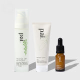 Pai Skincare Age Confidence Starter Kit featuring Salvation Jane moisturizer, Middlemist Seven cleanser, and Peptides & Omegas serum arranged on light background